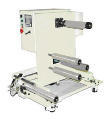 narrow web rewind stand, : "guided narrow web rewinder with load cells and a magpartical clutch